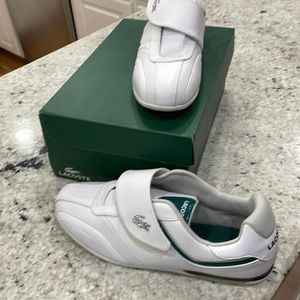 Never worn. White Lacoste.